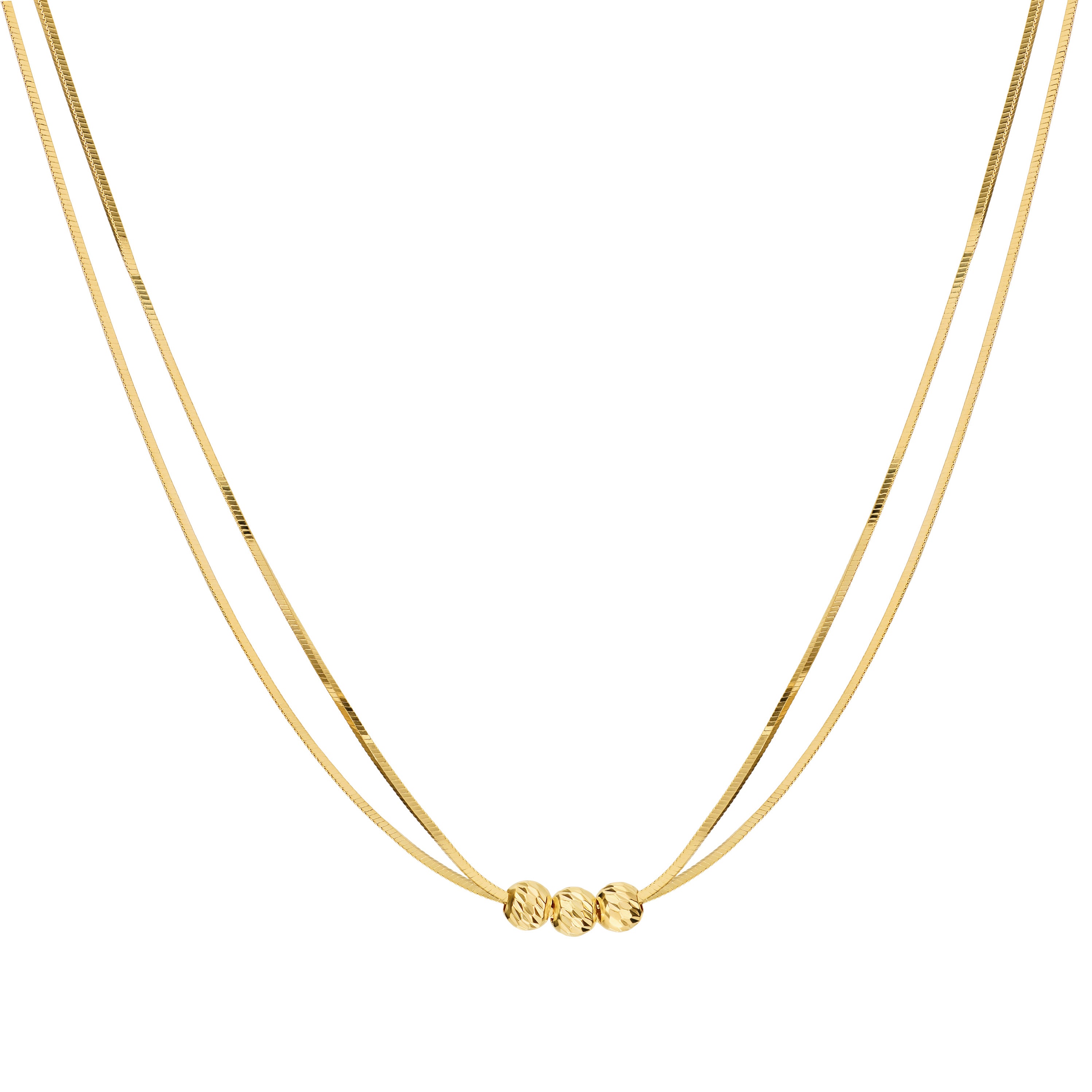 Gold necklace with three small beads on a white background