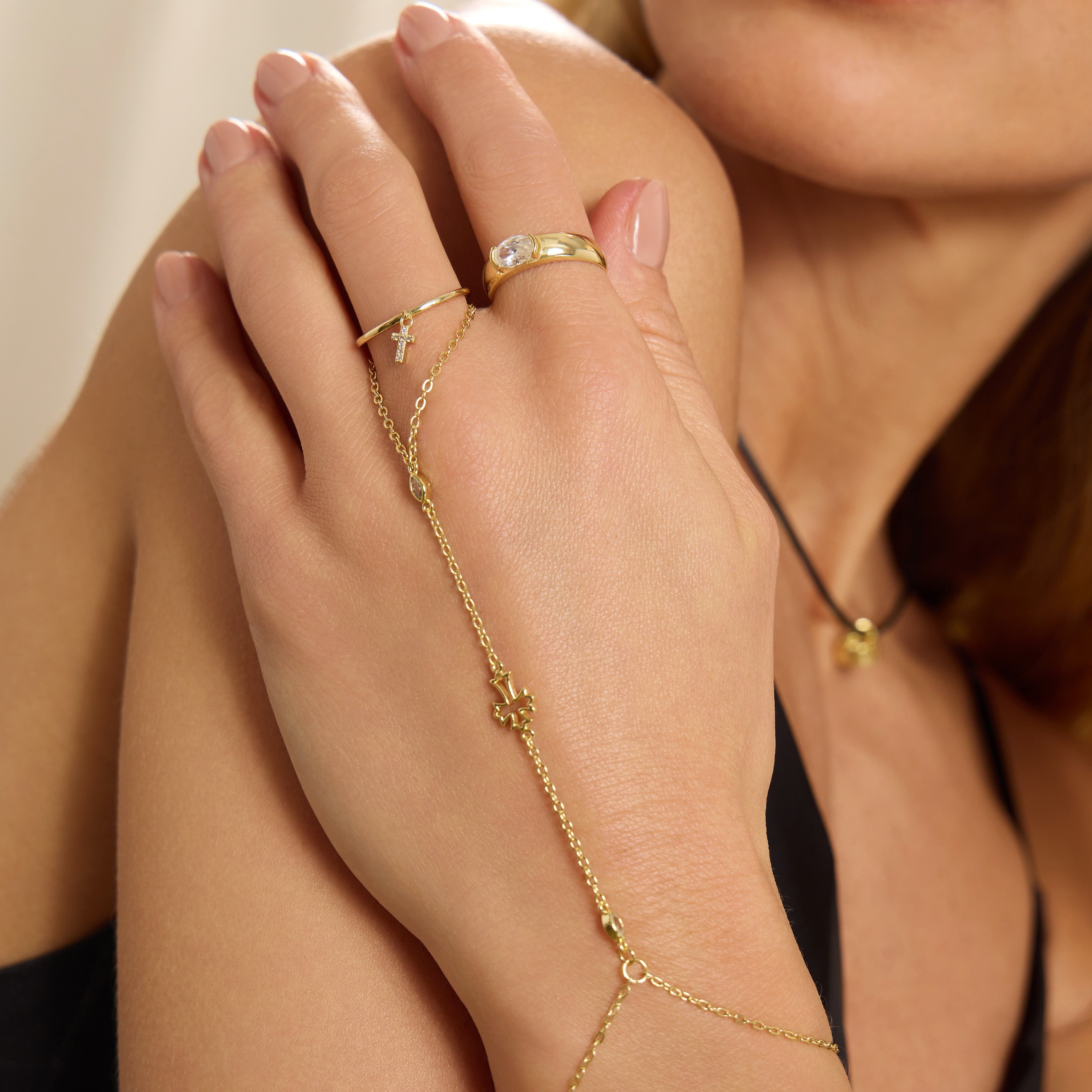 The Pavé Cross Drop Charm Ring